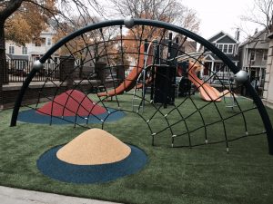 Combination PlayBound Poured-in-Place and Artificial Grass Surfacing
